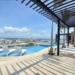 Stylish Condo With Roof Top Ocean Views Near Mamitas Beach And 5Th Ave