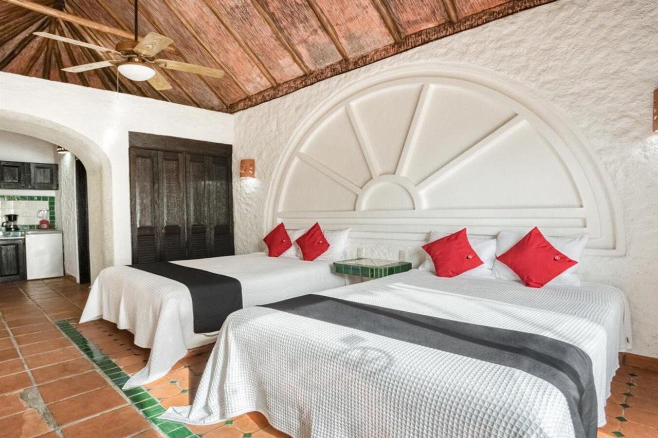 Capital O Mimi Del Mar, Hotel