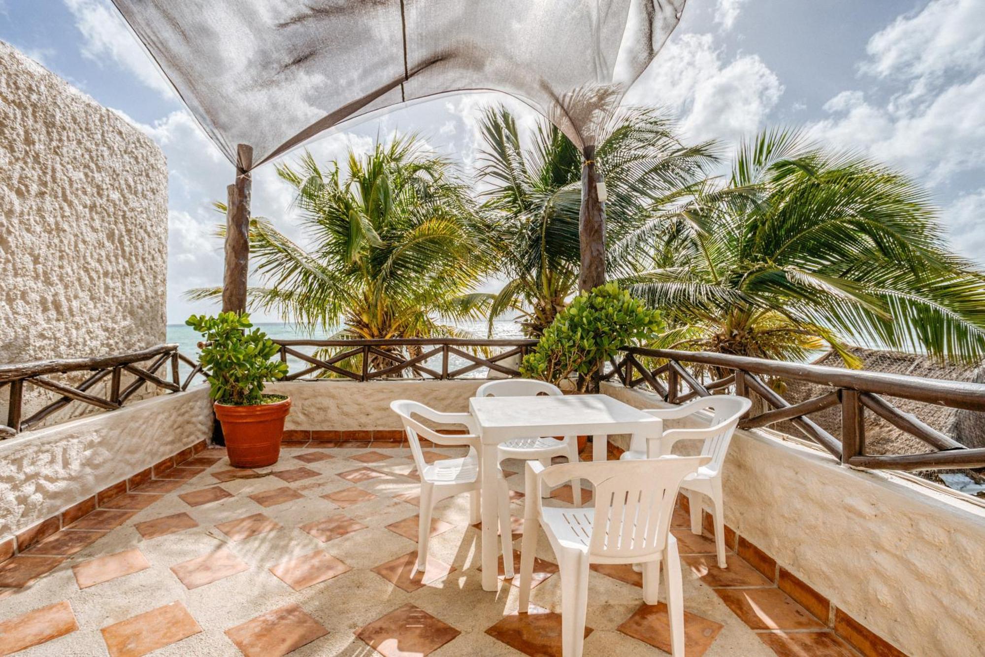 Hotel Capital O Mimi Del Mar,