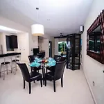 Encanto Riviera Condo Hotel