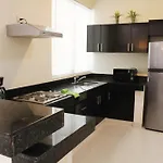 Encanto Riviera Condo Hotel