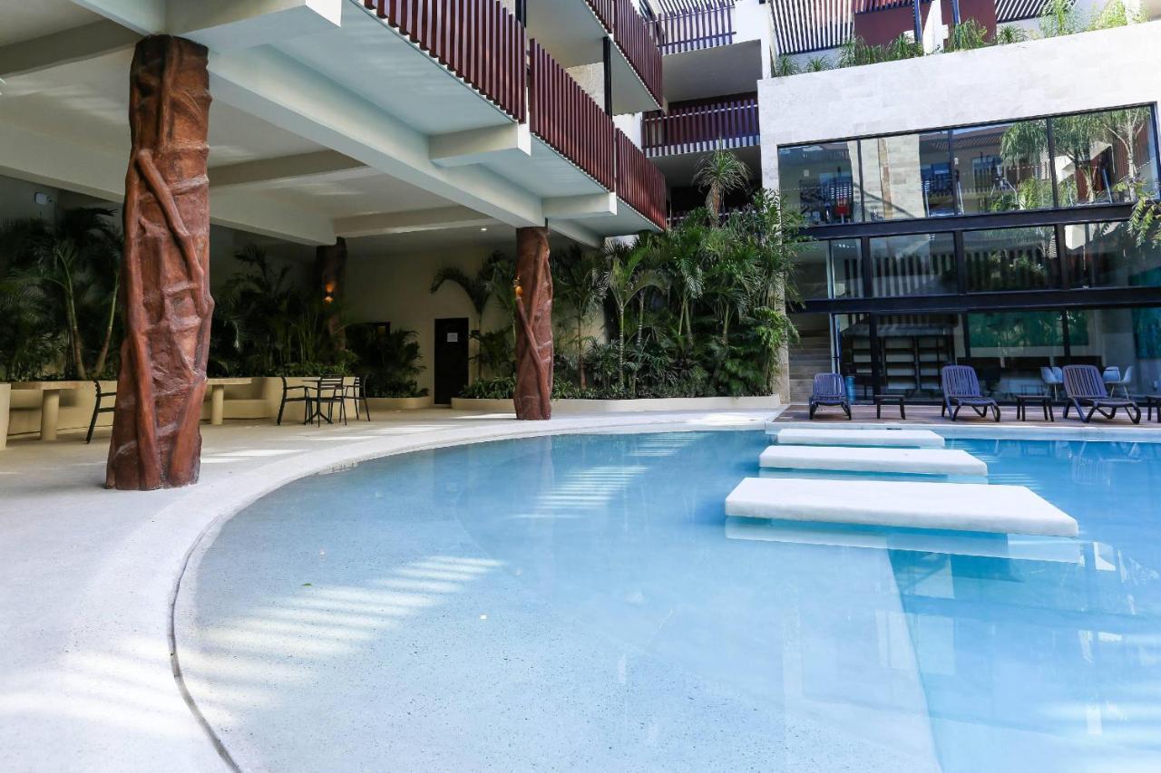 Palmares A04- 1bedroom Exquisite * Playa del Carmen