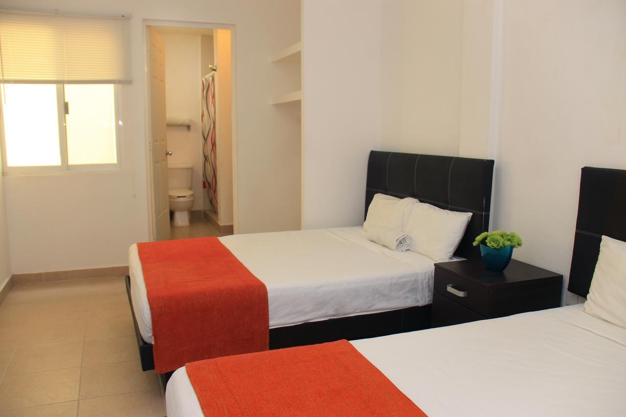 Xell Suites & Playa del Carmen
