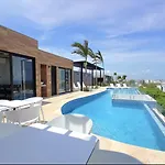 Stylish Condo With Roof Top Ocean Views Near Mamitas Beach And 5Th Ave